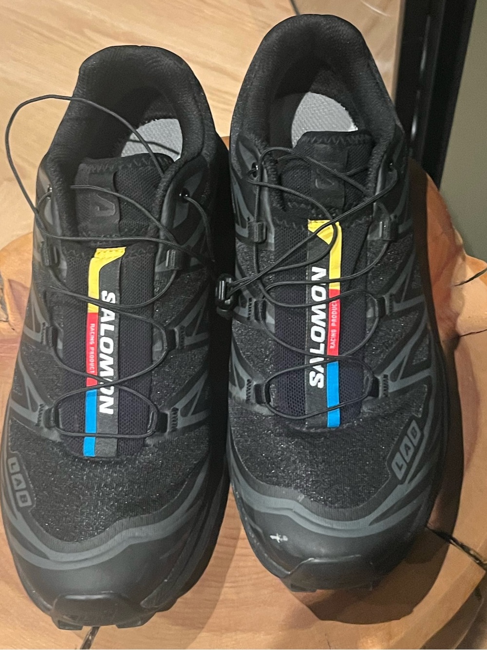 Salomon Black Trail Runners with Blue and Yellow Accents - Picture 2 of 4